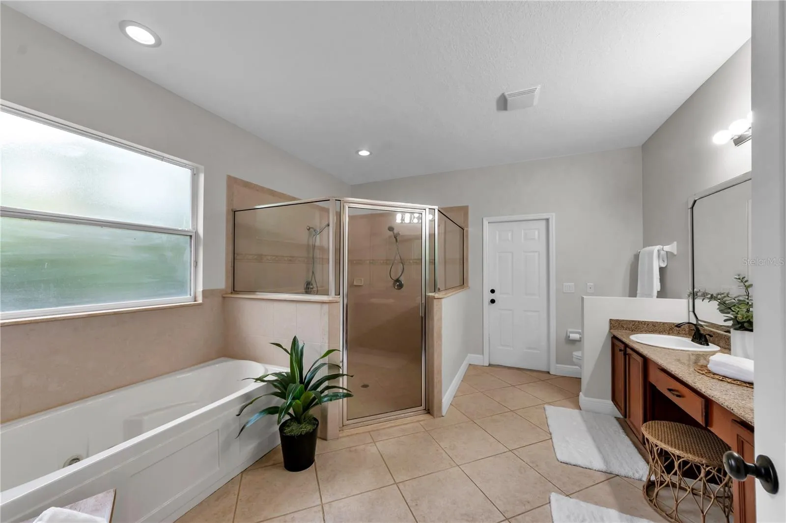 Primary Bathroom with door to screened porch