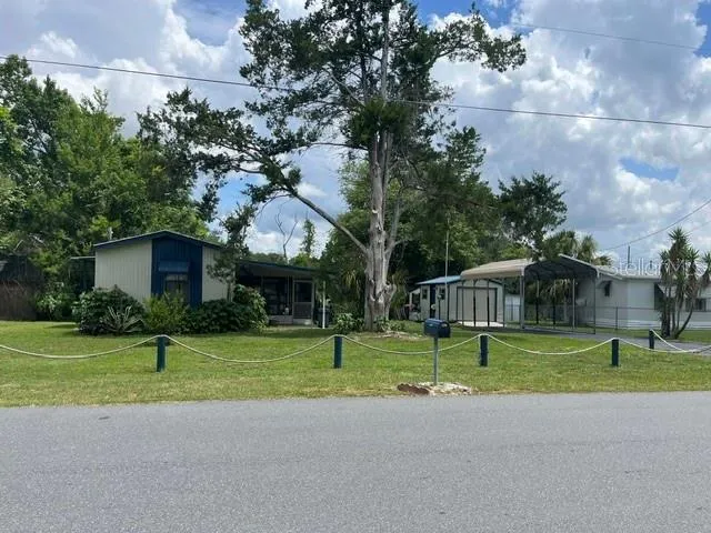 Property is on a dead end street - 80ft of canal with concrete seawall, private backyard to enjoy nature with a fire. Plenty of room for your boat!