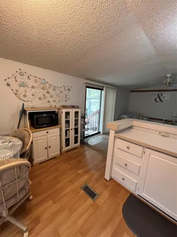 kitchen with table and rolling chairs