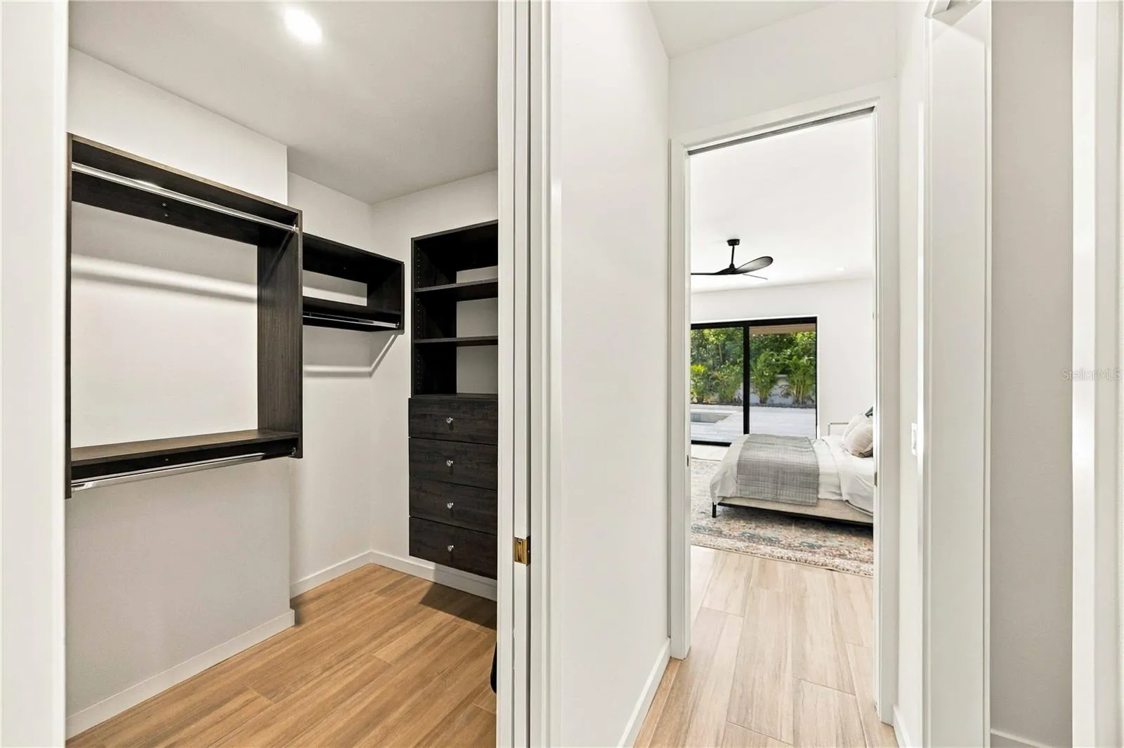Primary Walk-In Closety with Built-ins