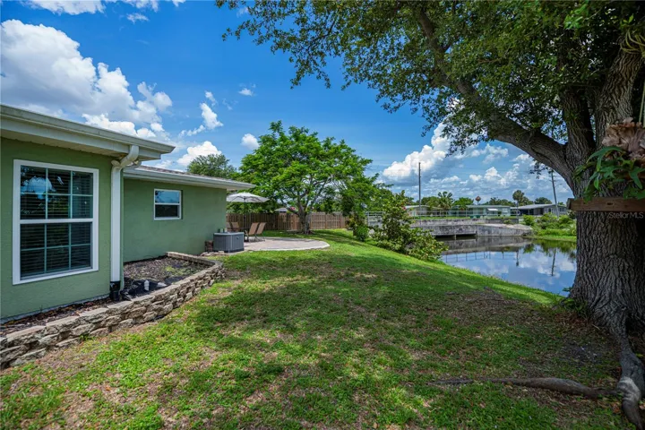 Tropical Landscaping and Peaceful Water Views
