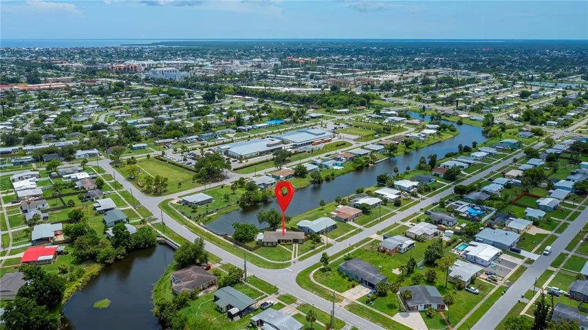 Corner Lot with Scenic Canal Frontage