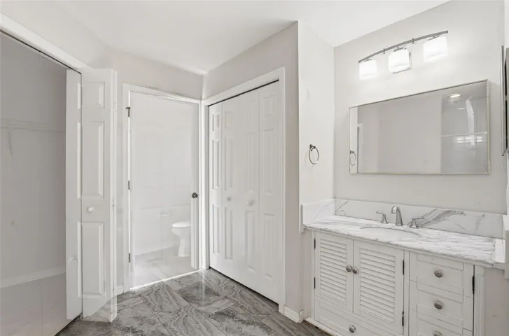 Ensuite Bathroom with Oversized Vanity with Ample Storage.