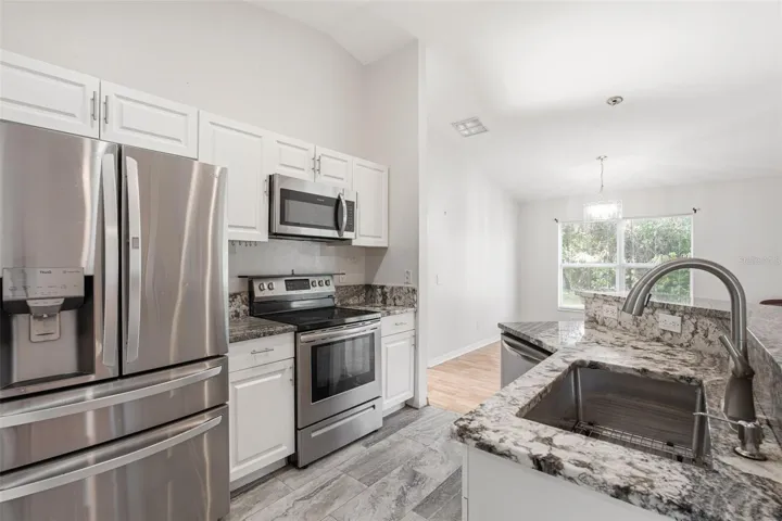 Updated Kitchen with Granite Countertops.