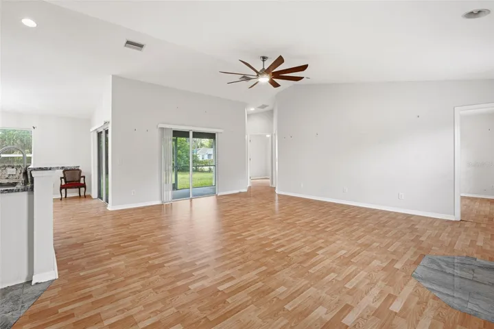 Vaulted Ceilings, Sliding Glass Doors with Easy Access to the Screened Lanai.