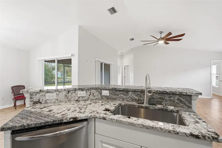 Breakfast Bar Seating, Overlooking the Main Living Area.