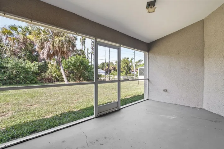Screened Lanai with Backyard Views.