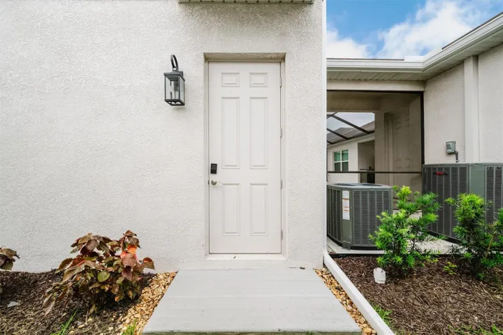Oustide Door Entry as well as Garage Entry