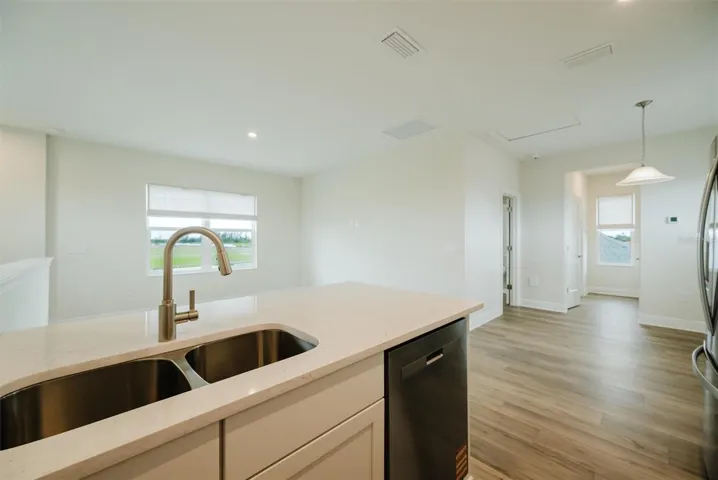 Kitchen Looking into living room, eating nook and hallway to bedroom/bathroom