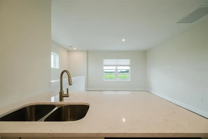 Kitchen looking out to Living room