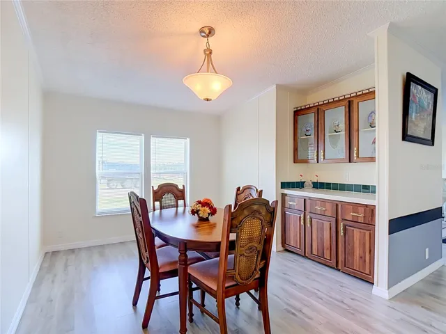 Formal dining room is located right off the kitchen
