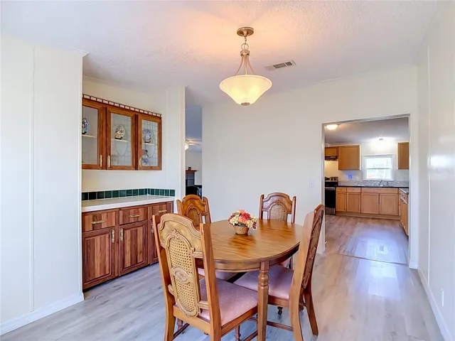 Formal dining room offers plenty of space to host the next family get-together.