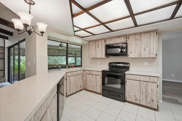 Spacious kitchen with newer appliances and ample storage