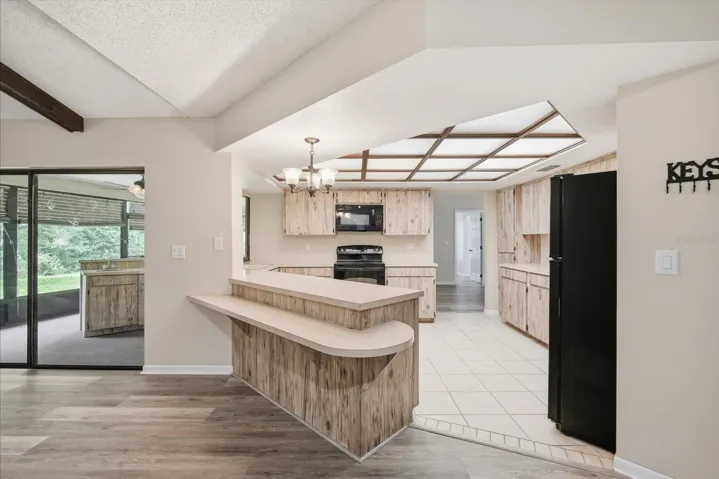 Spacious kitchen with newer appliances and ample storage