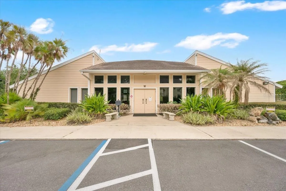 The community clubhouse available for your get togethers with the pool behind it