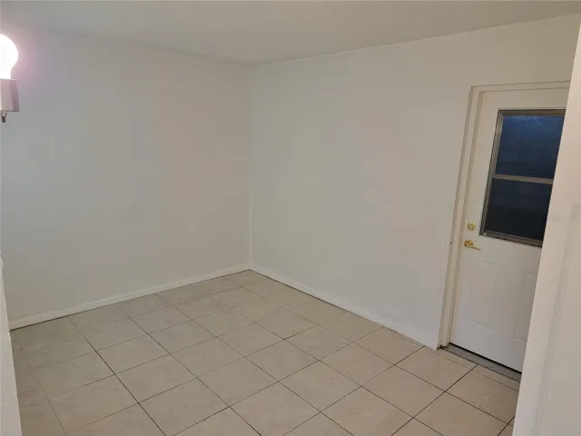 Office/nursery with door to garage