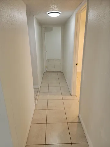 Hall to 4th and 5th BR and Garage