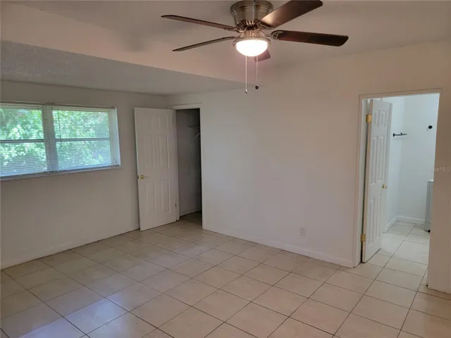 Main BR with walk-in and door to bath