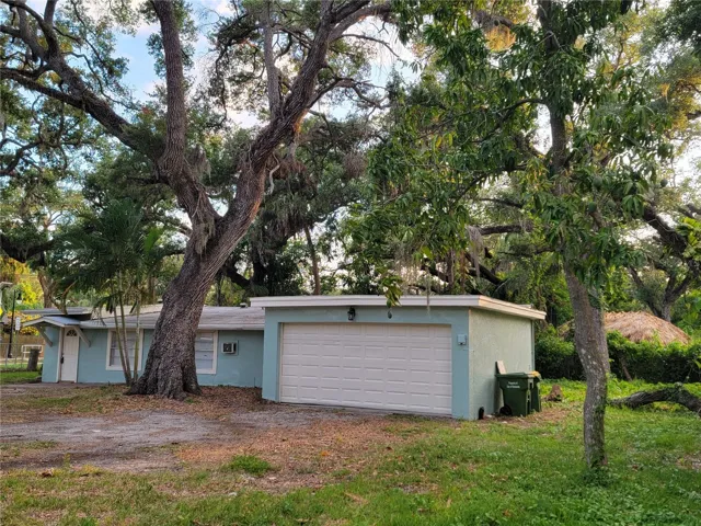 View with Garage and front door (side)
