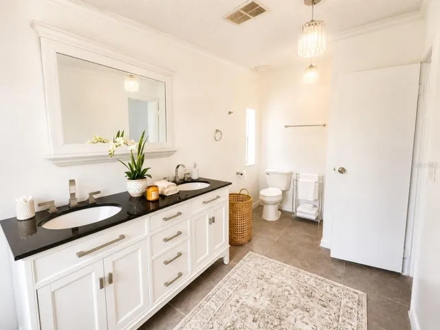 "Comfortable Owner's Retreat with Ensuite Bath and Natural Light"