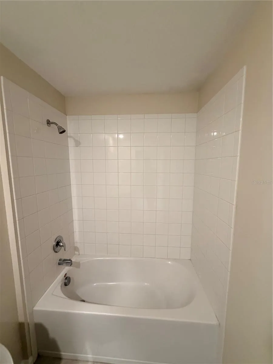 Stunning spa-style shower with built-in hot tub, in immaculate, like-new condition.