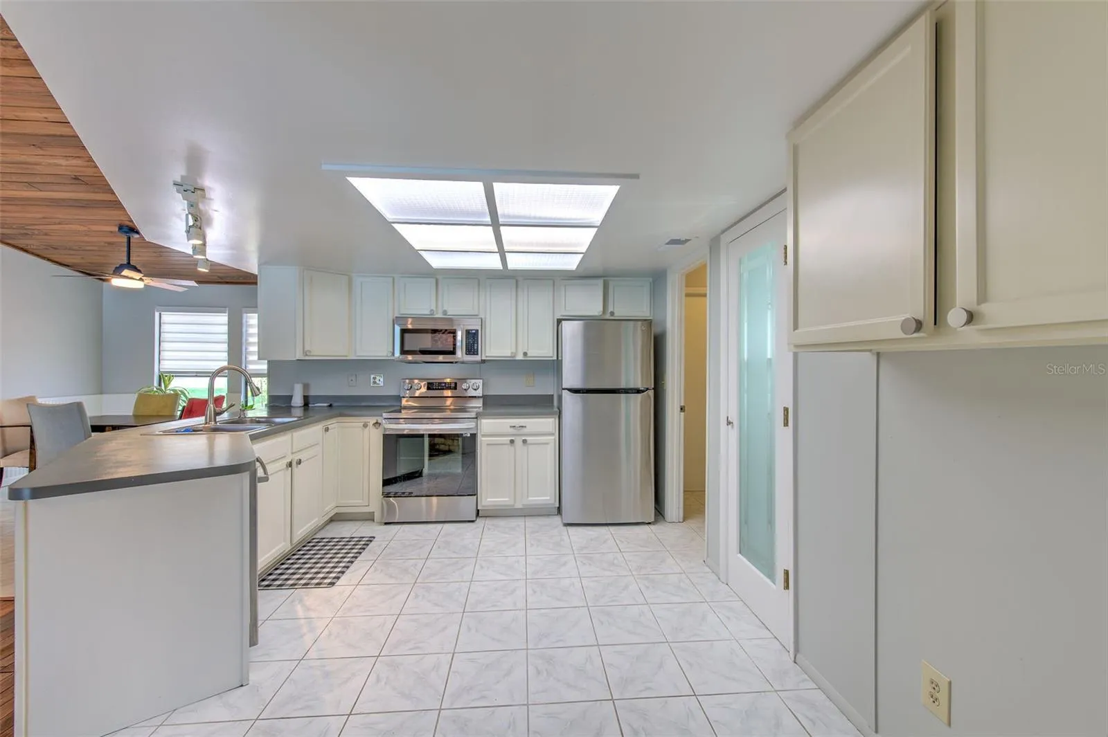 Kitchen open to living room and dining room