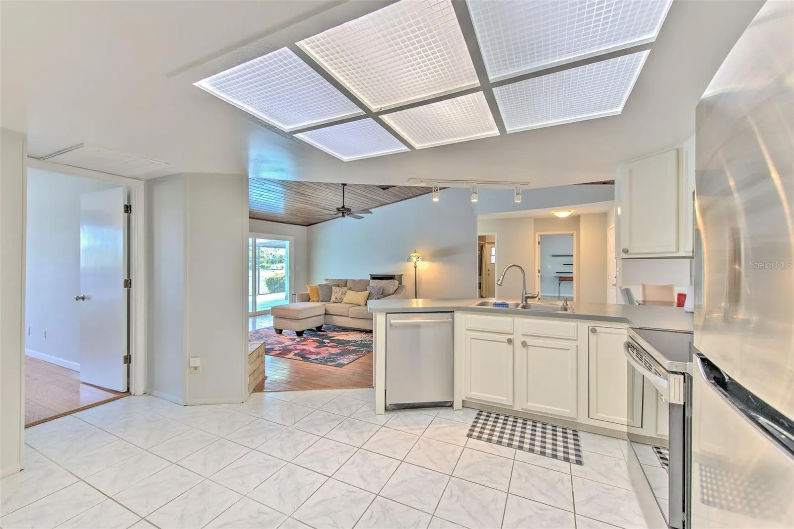 Kitchen open to living room and dining room