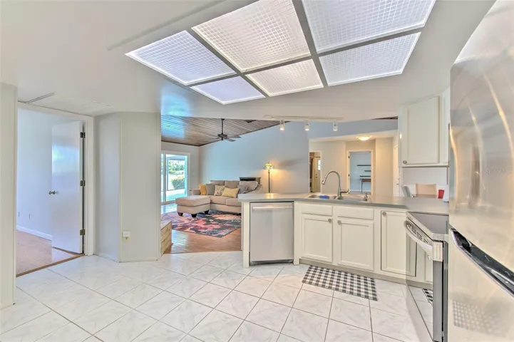 Kitchen open to living room and dining room
