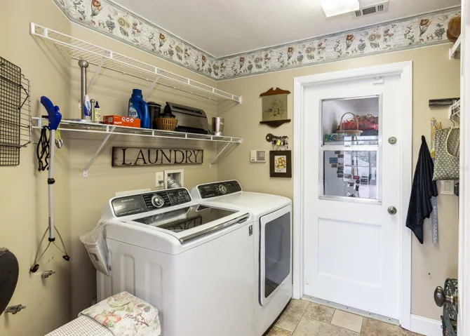 Laundry with another Access to Garage