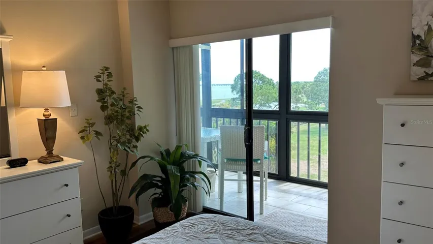 Primary Bedroom #1 Sliding Doors onto Waterview Porch