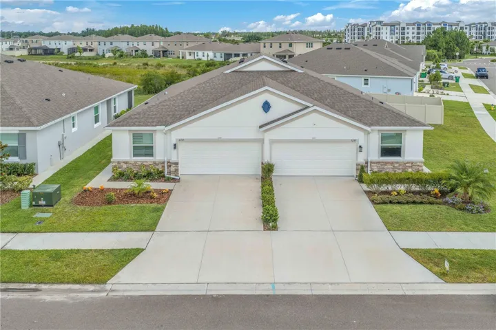 beautifully maintained 3-bedroom, 2-bath villa in the highly desirable Woodcreek community of Wesley Chapel