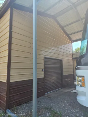 front exterior of storage shed with 2nd story