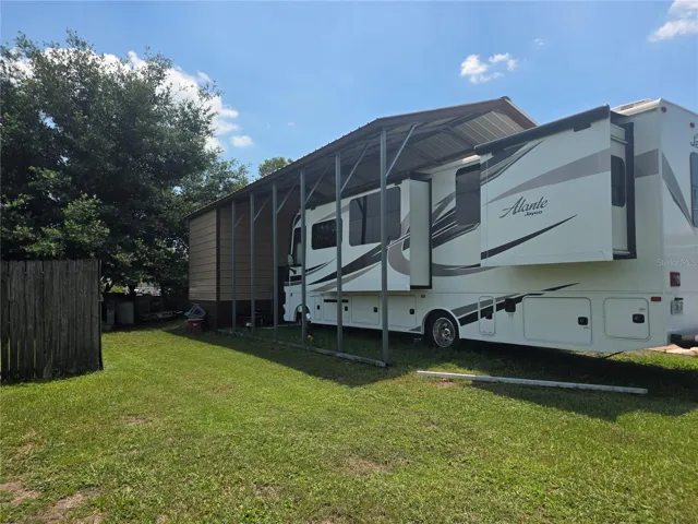 RV/Carport with Storage Shed
