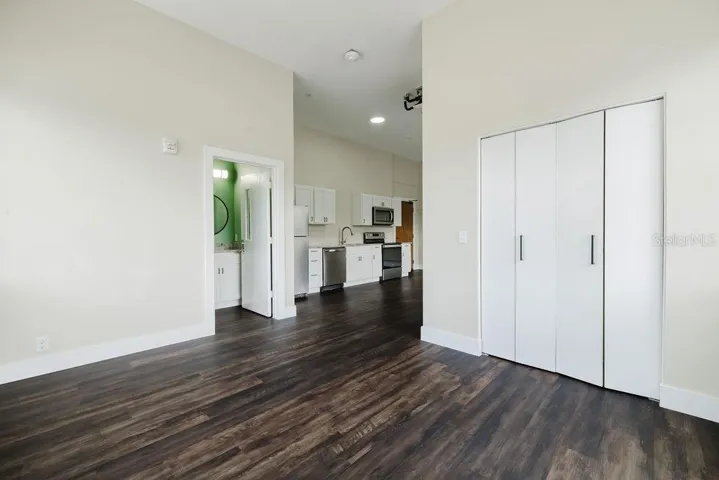 Bedroom area with built-in closet.