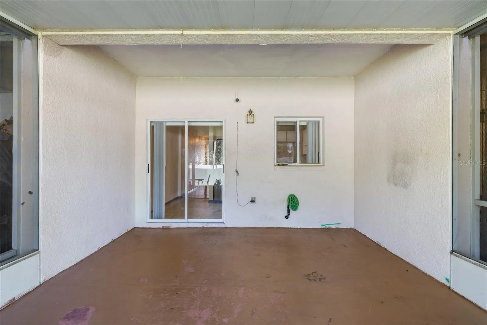 Outside screened in covered patio