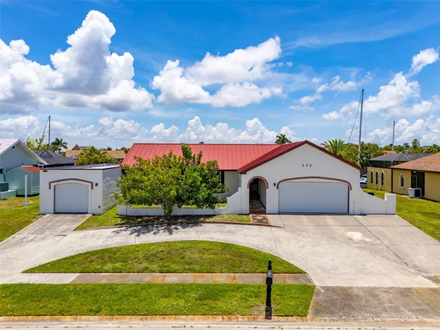4 Car Garage with 100 Year Standing Seam Metal Roof