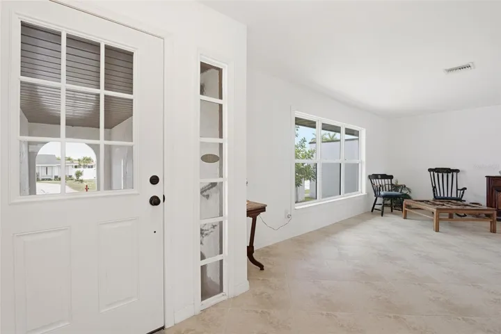 Front Entry Door with View of Living Room