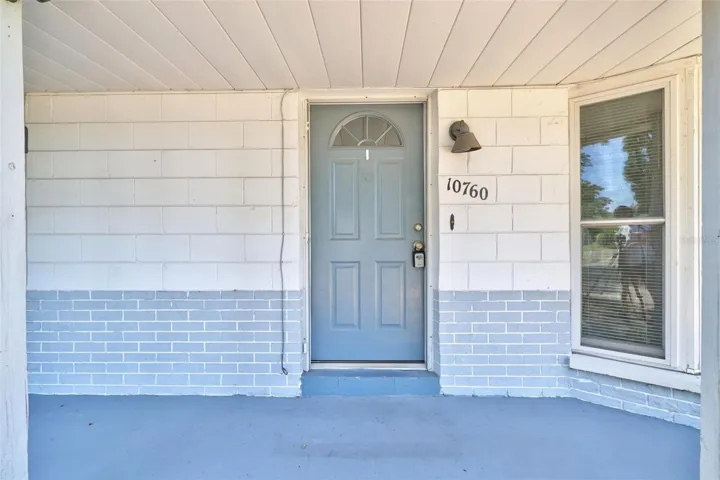 Welcome to your new home with a shaded entrance