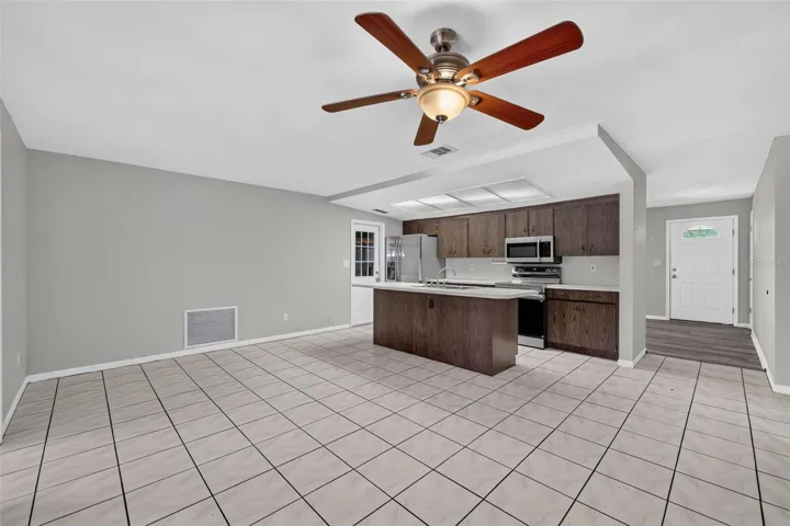 Large Open floor plan with Kitchen-Living unstaged Room Combo so your never far from the action