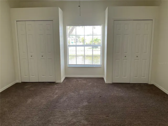 Primary Bedroom with view of canal