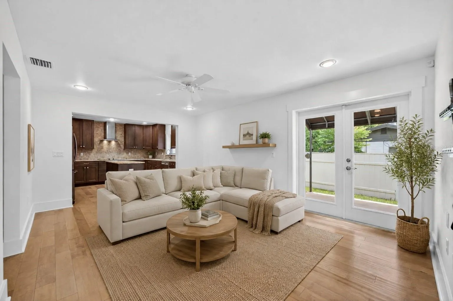 Open living room &amp; kitchen - virtually staged