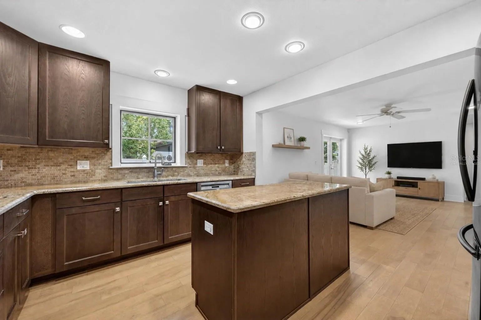 Open concept kitchen &amp; living room - virtually staged