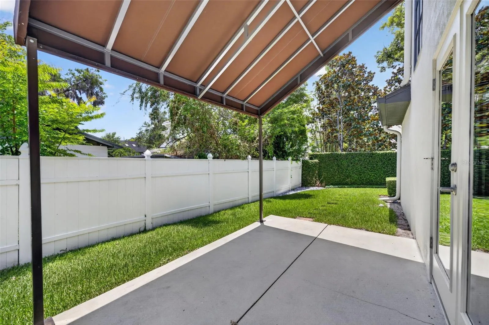 Deck with awning in side yard