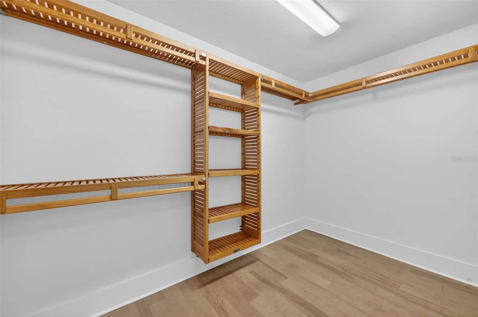 Spacious walk-in closet in primary suite