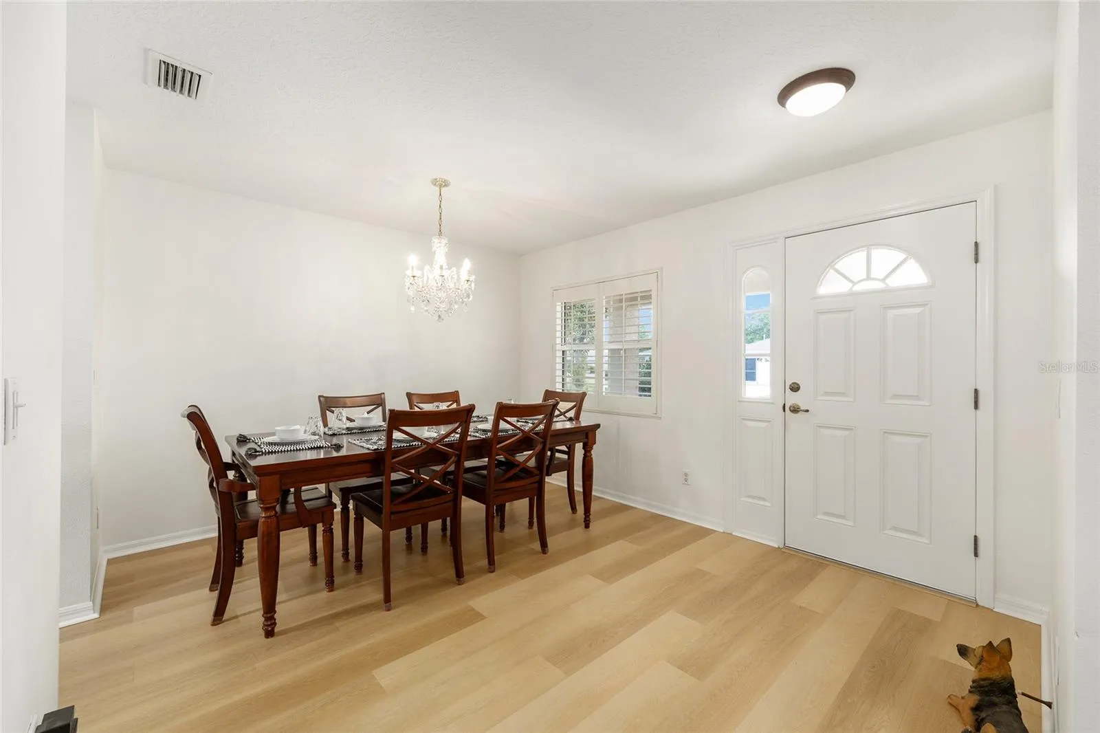 Formal dining room comfortably seats 6