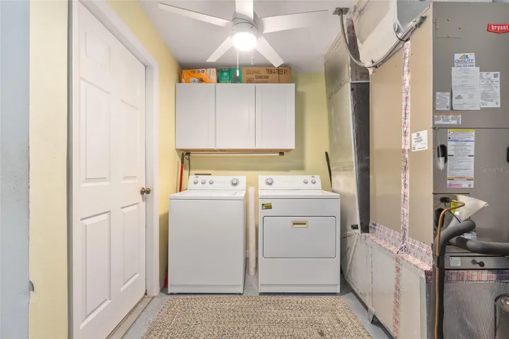 Cabinets added to laundry area.