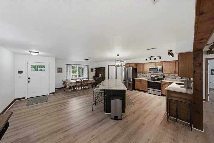 Entryway, dining room, kitchen