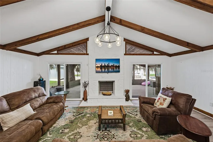 Living room- fire place, and sliding glass doors to back porch