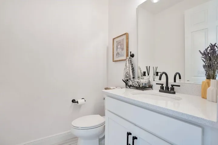A convenient half bath completes the main level.