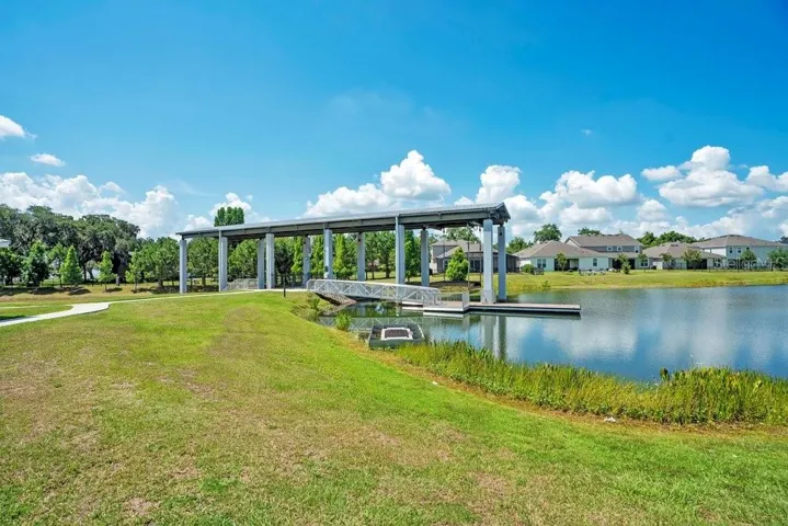 One of the community's most unique features—a PRIVATE BOAT LIFT provides access to the Chain of Lakes, making it easy to enjoy boating, fishing, and waterfront adventures.